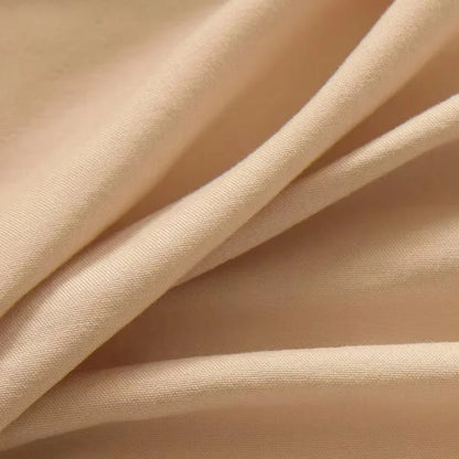 Alèse pour matelas de couleur pêche texture