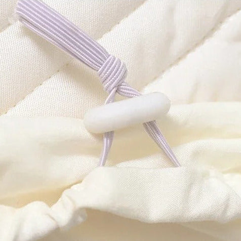 Alèse pour matelas attache