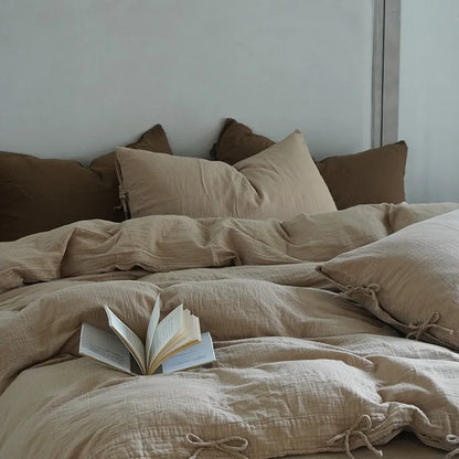 Housse de couette en gaze de coton de couleur beige avec livre