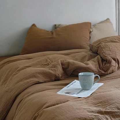 Housse de couette en gaze de coton de couleur caramel avec une tasse