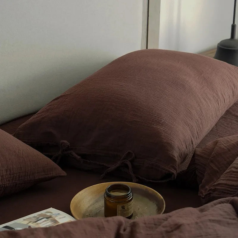 Housse de couette en gaze de coton de couleur pourpre avec une chandelle