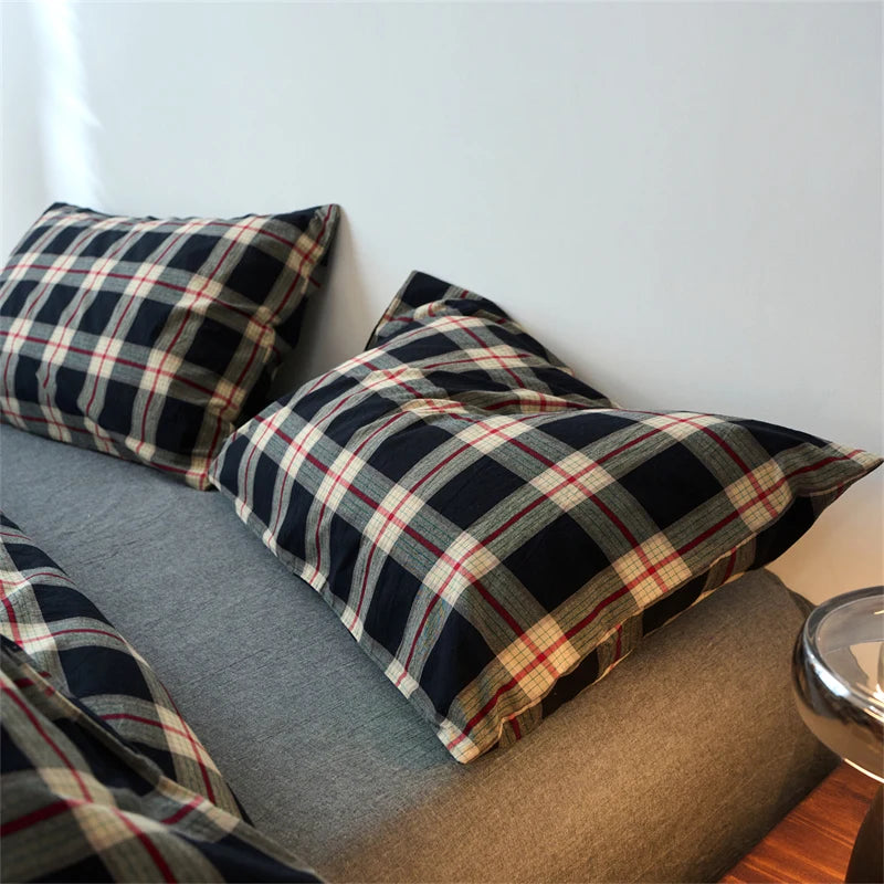 Housse de couette en coton bleu avec deux oreillers