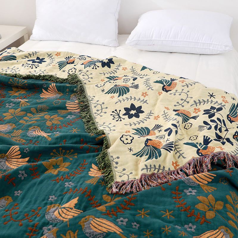Couverture de lit reversible avec des oiseaux