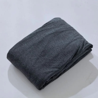 Draps housses jersey gris plié