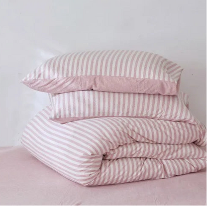 Housse de couette en jersey rose pliée