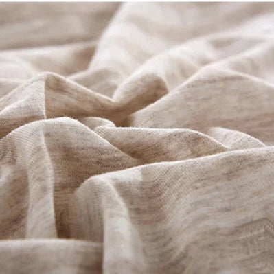 Housse de couette jersey en coton beige vue de près